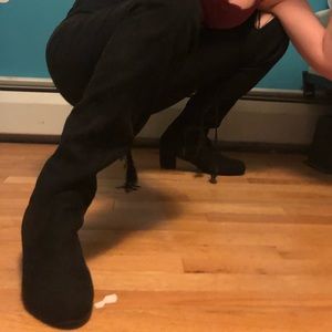 Thigh high black tie up boots